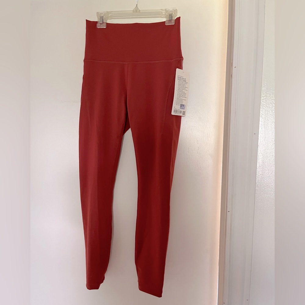 LULULEMON WUNDER TRAIN TIGHTS 25” CAYENNE SIZE 6.  New with tags